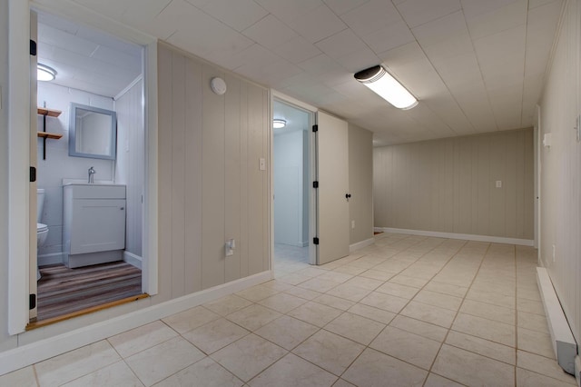 tiled empty room with sink