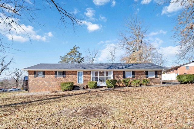 single story home with a front yard