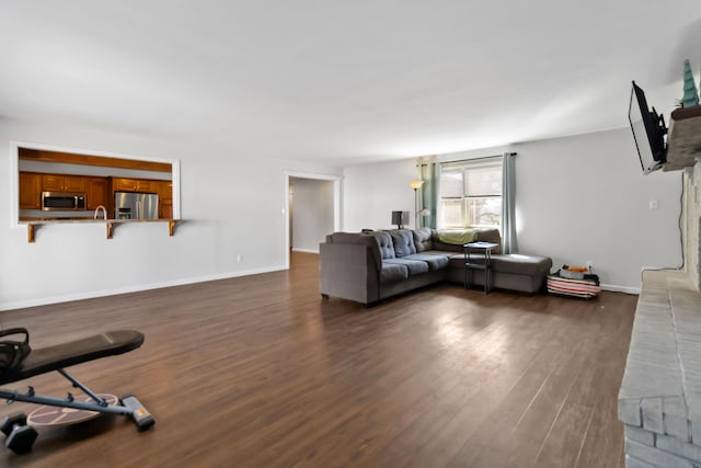 living room featuring dark hardwood / wood-style floors