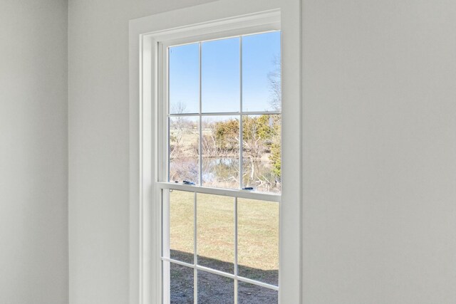 interior details featuring a water view