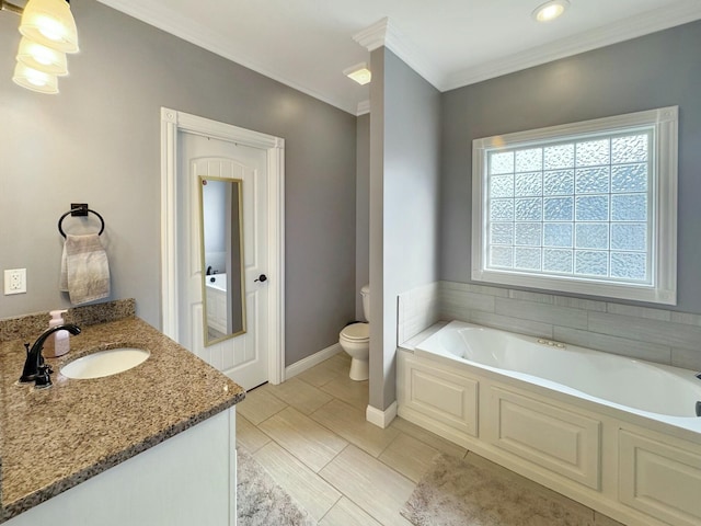 bathroom featuring vanity, a bath, crown molding, and toilet