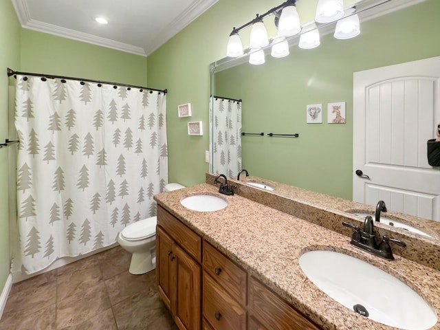 bathroom featuring crown molding, vanity, tile patterned floors, and toilet