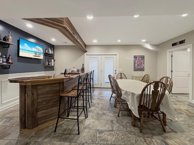 dining room with indoor bar