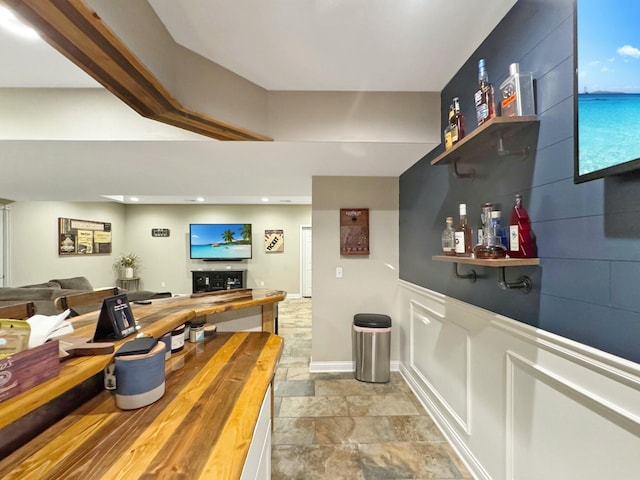 bar featuring butcher block countertops