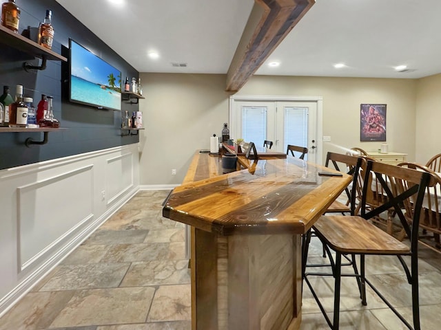 bar featuring french doors