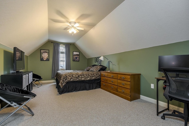 bedroom featuring lofted ceiling, ceiling fan, and carpet flooring