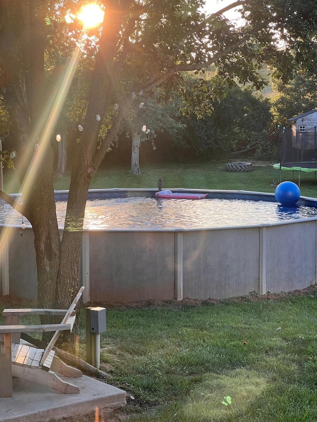 view of yard featuring a trampoline