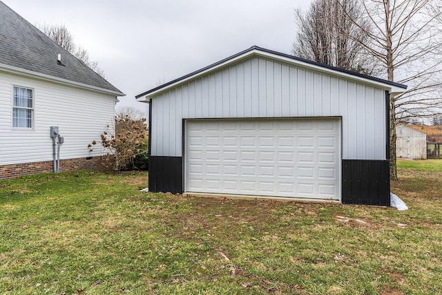 garage with a yard