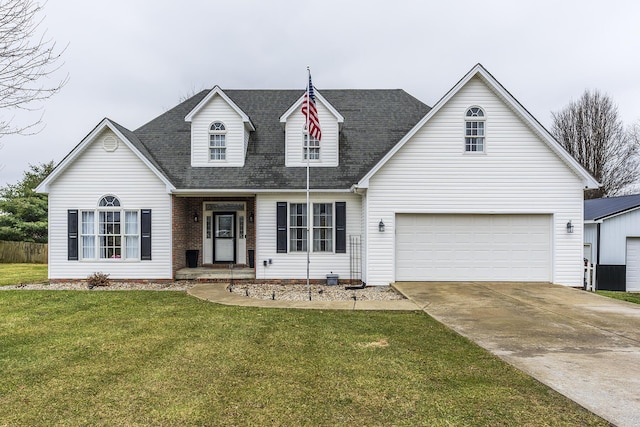 cape cod home featuring a garage and a front yard