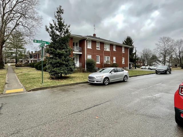 view of road with curbs and sidewalks