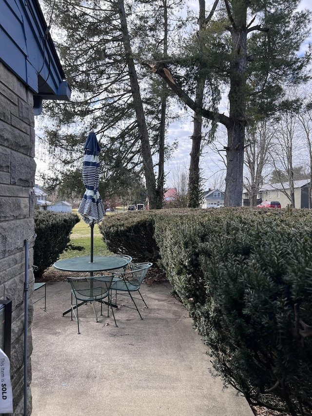view of patio with outdoor dining area