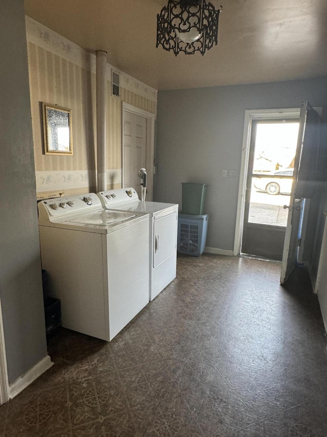 laundry room featuring separate washer and dryer