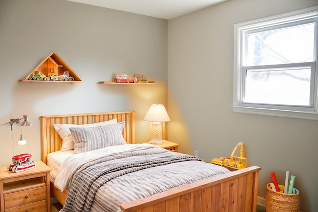 bedroom with multiple windows