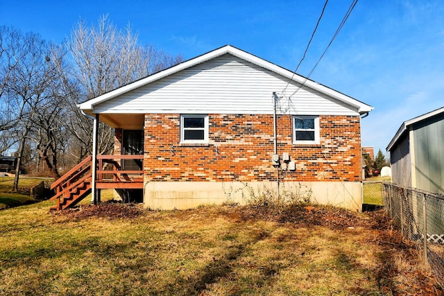 view of property exterior featuring a yard