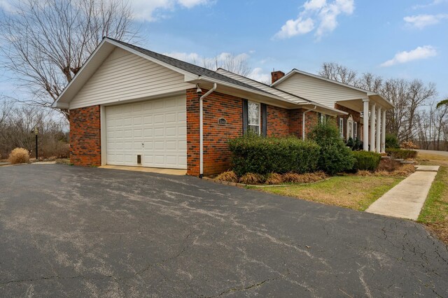 view of front of property with a pergola, a deck, and a front yard