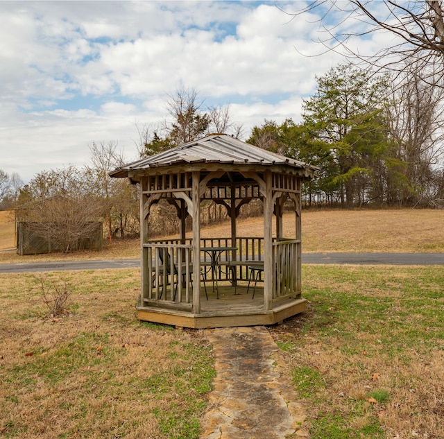 view of community featuring a gazebo and a lawn