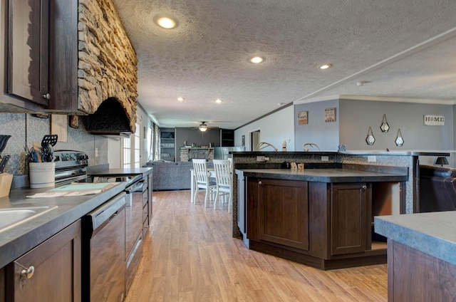 kitchen featuring light hardwood / wood-style flooring, ceiling fan, range with electric cooktop, dark brown cabinetry, and stainless steel dishwasher