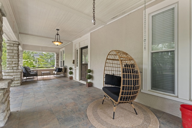 view of patio featuring covered porch