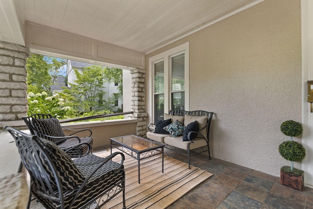 sunroom featuring wood ceiling