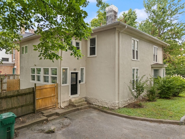 back of house with a patio area