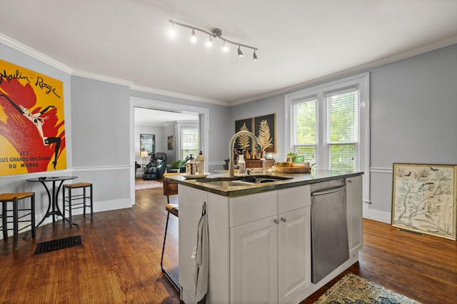 kitchen with white cabinetry, sink, dark hardwood / wood-style flooring, stainless steel dishwasher, and a center island with sink