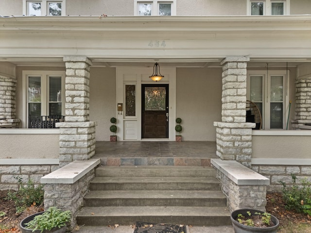 entrance to property with covered porch