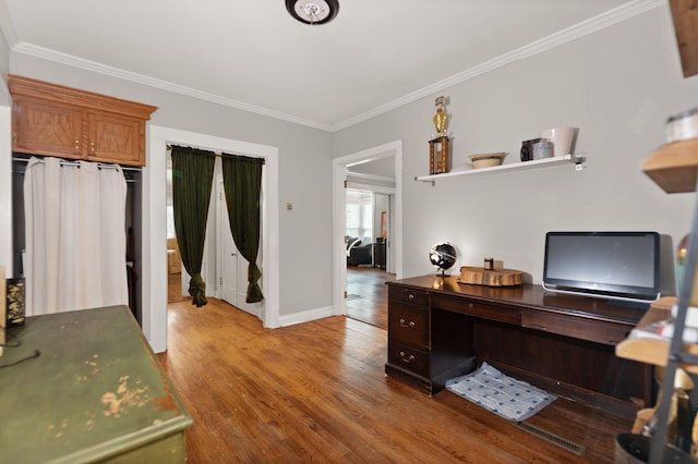 office area featuring crown molding and wood-type flooring