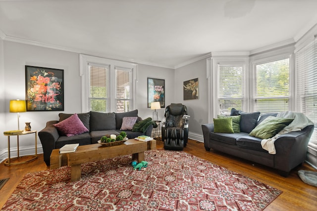 living room with crown molding, plenty of natural light, and hardwood / wood-style flooring