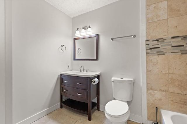 bathroom with vanity, toilet, tile patterned flooring, and a textured ceiling