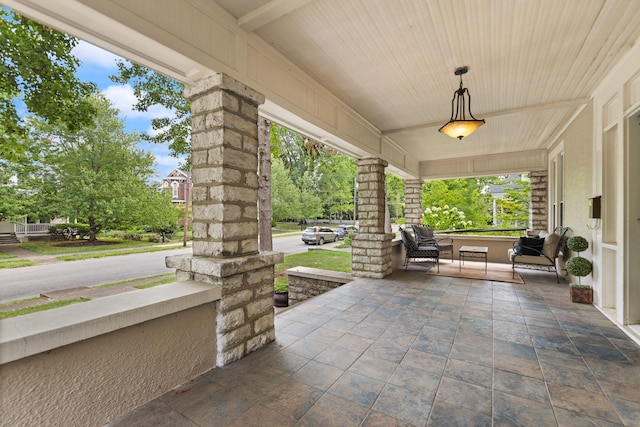 view of patio featuring covered porch