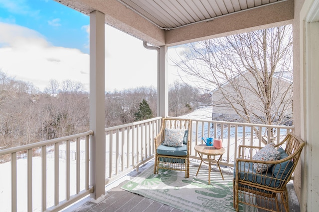 view of snow covered deck