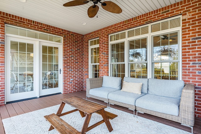 exterior space with ceiling fan