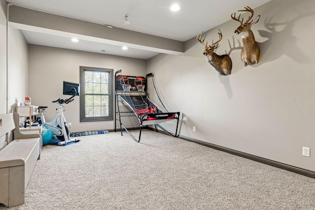 exercise area featuring carpet flooring