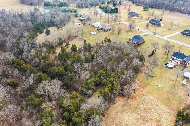 birds eye view of property featuring a rural view