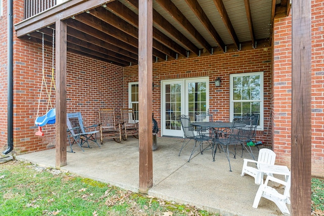 view of patio featuring french doors