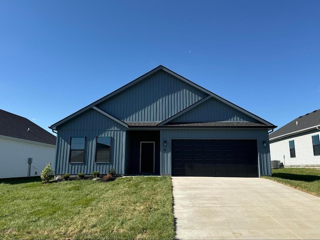 view of front of property featuring an attached garage, central air condition unit, concrete driveway, a front lawn, and board and batten siding