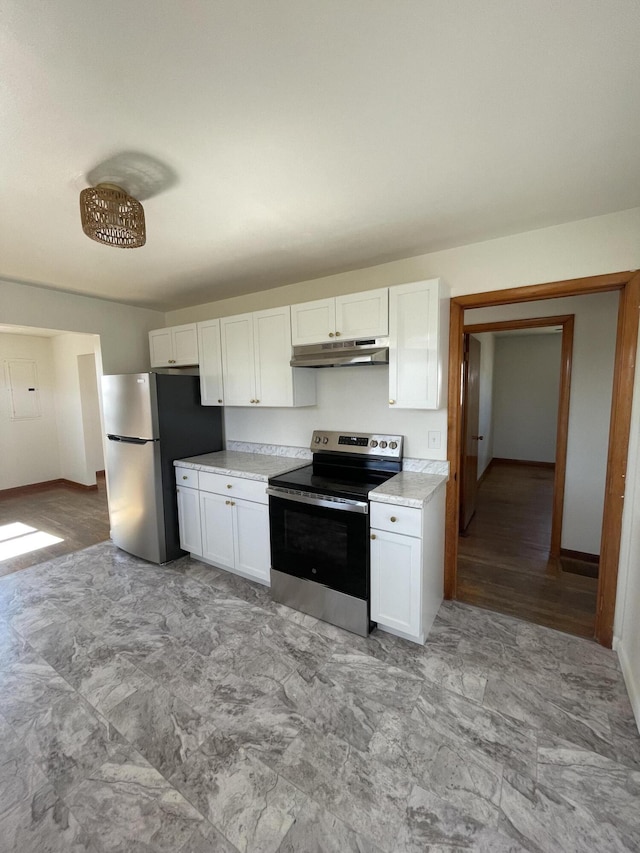 kitchen featuring white cabinetry and stainless steel appliances