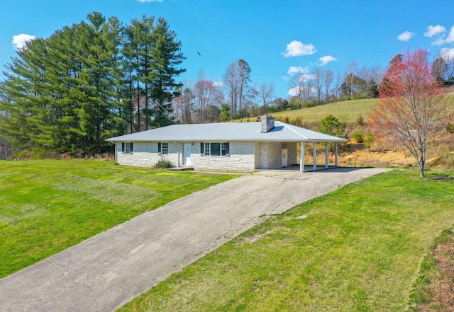 ranch-style house with a carport and a front lawn