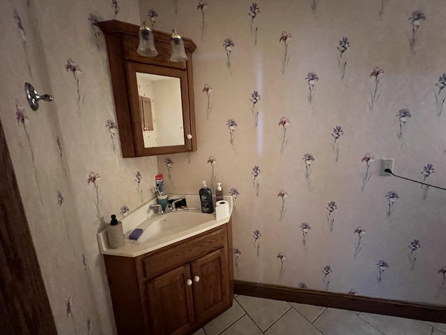 bathroom with tile patterned flooring and vanity