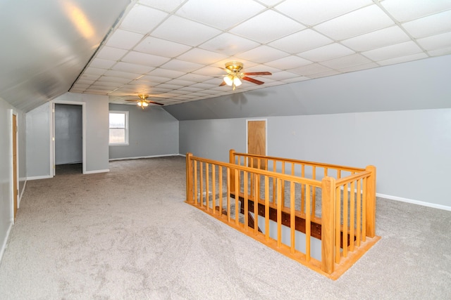 bonus room with ceiling fan, lofted ceiling, and carpet