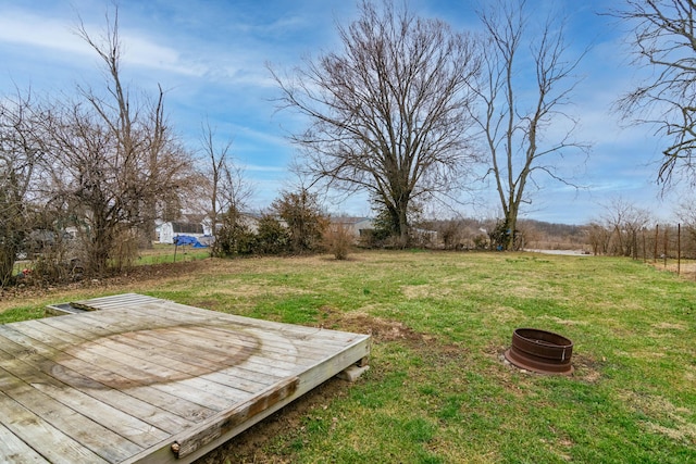 view of yard featuring a wooden deck