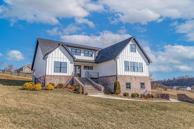 view of front of house with a front lawn