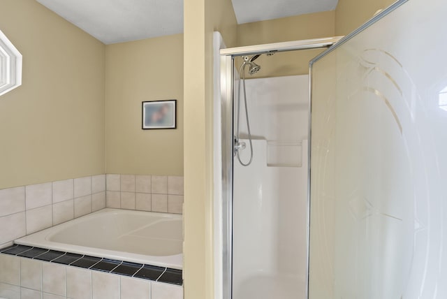 bathroom with independent shower and bath