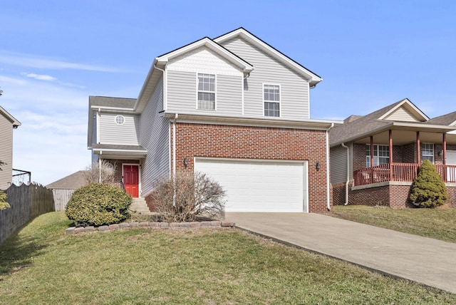 view of front of property with a garage and a front yard