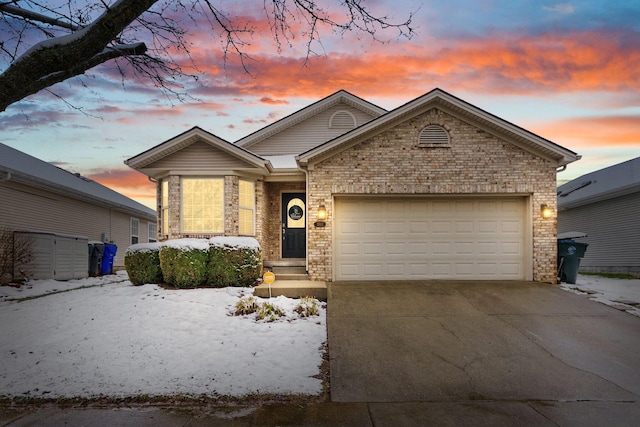 view of front of home with a garage