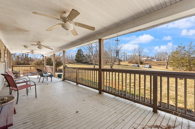 wooden deck with ceiling fan