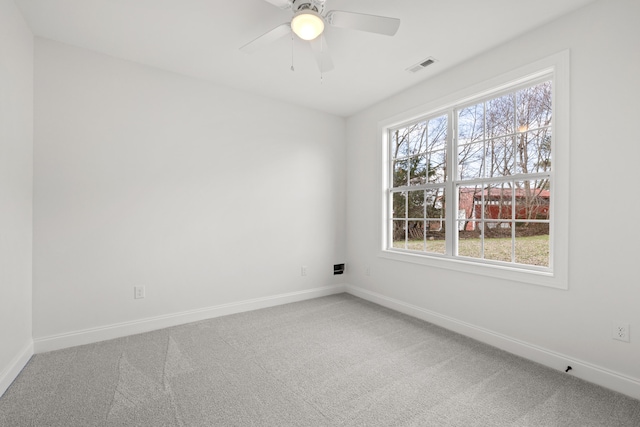 unfurnished room featuring carpet floors and ceiling fan