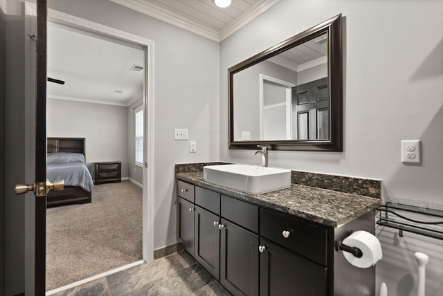 bathroom featuring vanity and ornamental molding