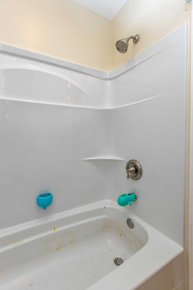 bathroom featuring washtub / shower combination