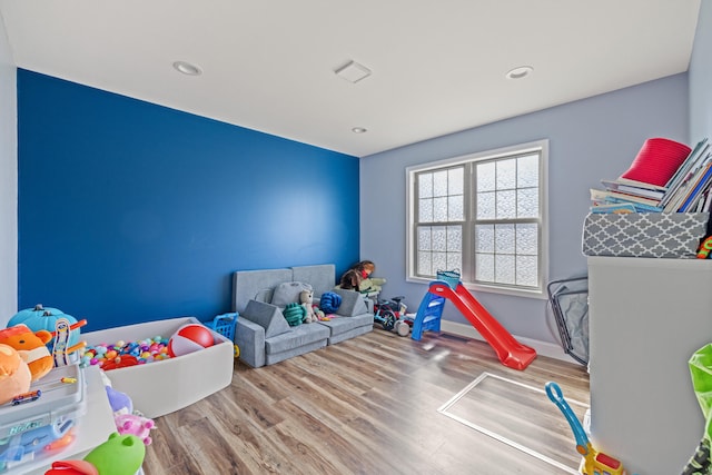 game room featuring wood-type flooring